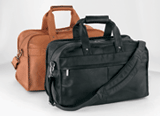 tan and black Vaqueta Napa small carry-on bags