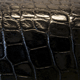 swatch of black croco-grain leather