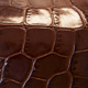 swatch of brown croco-grain leather